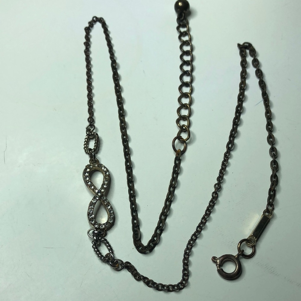 Delicate Infinity Pendant Necklace in Dark Gold